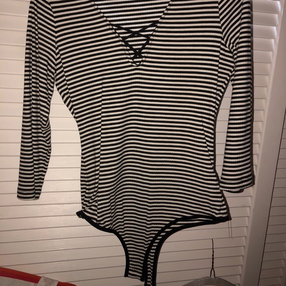 bebe Tops - Bebe striped tie up bodysuit